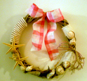 Summer wreath with natural sea shells and starfish
